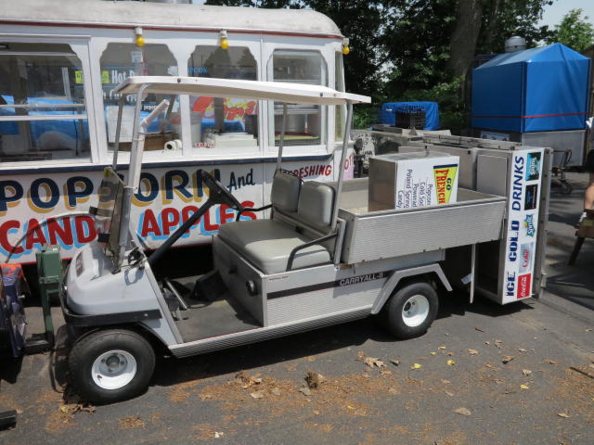 Club Car Carry All II Golf Cart with Dump Trailer including additional Canopy and Beverage Cart
