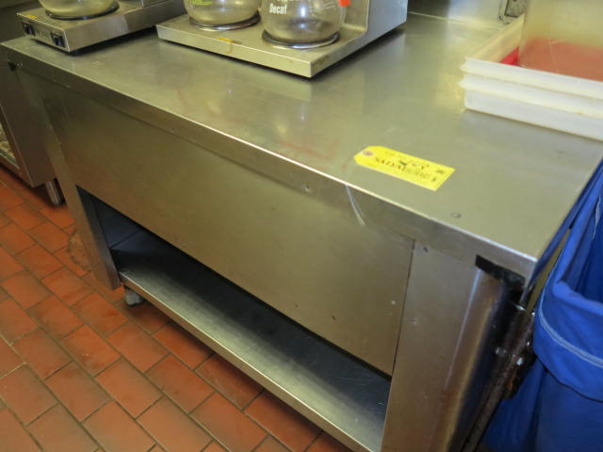 4' x 30'' x 34'' Stainless Steel Table with Backsplash