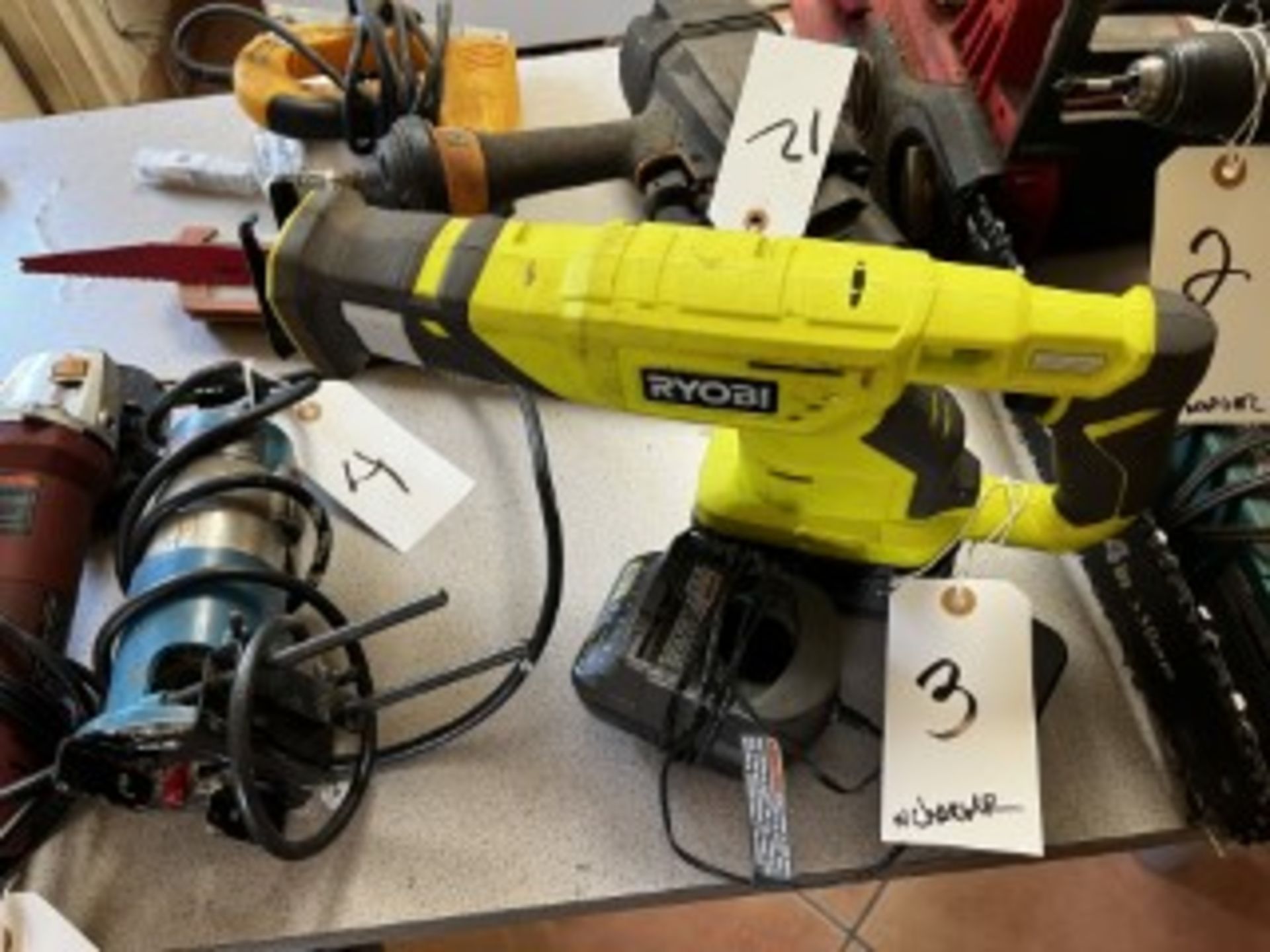 RYOBI CORDLESS SAWZALL WITH CHARGER - 18V