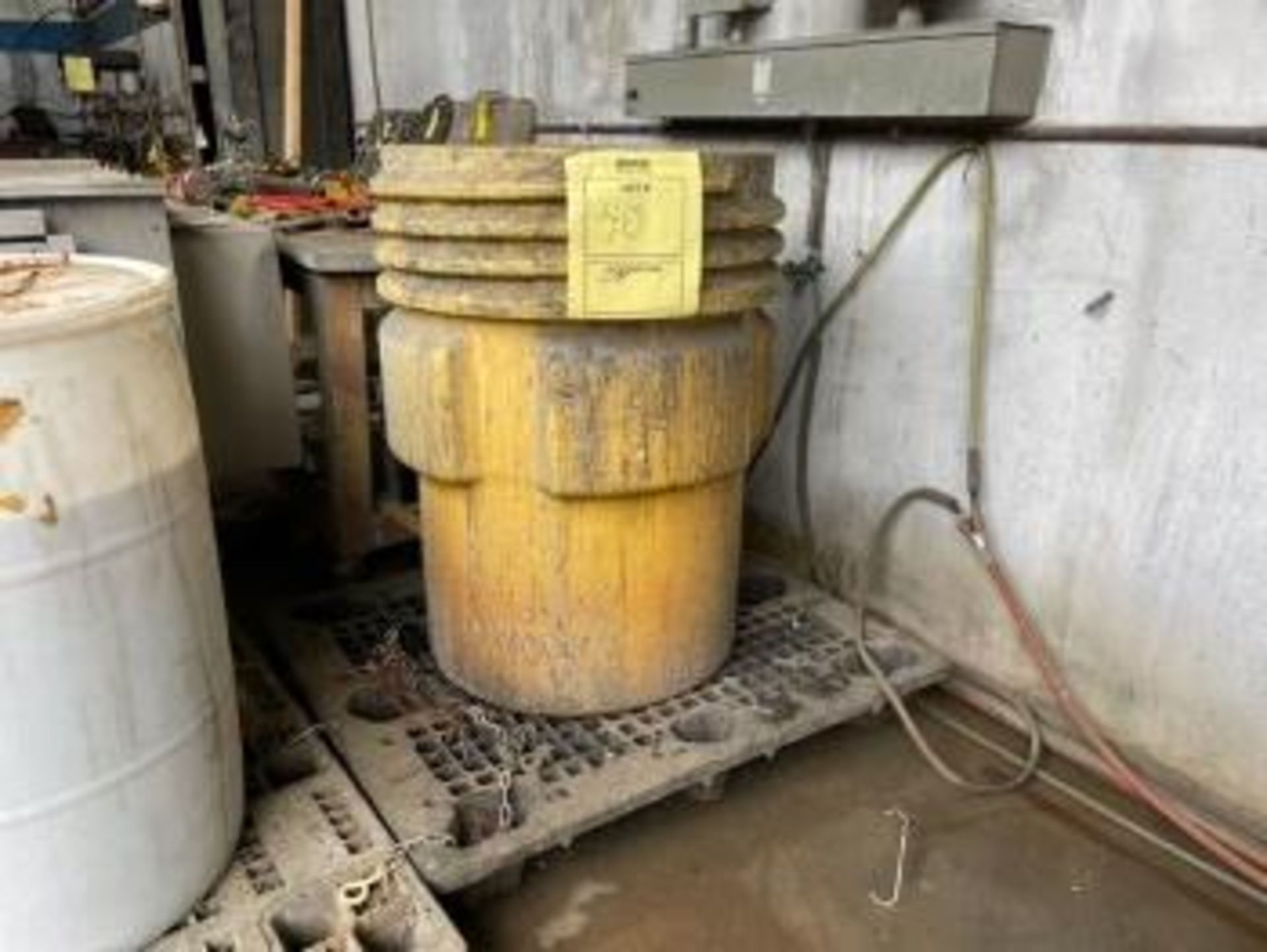 YELLOW RESIN TANK WITH PAINT STRIPPER - 80 GALLON / APPROXIMATELY HALF FULL (LOCATED IN HIALEAH, FL)