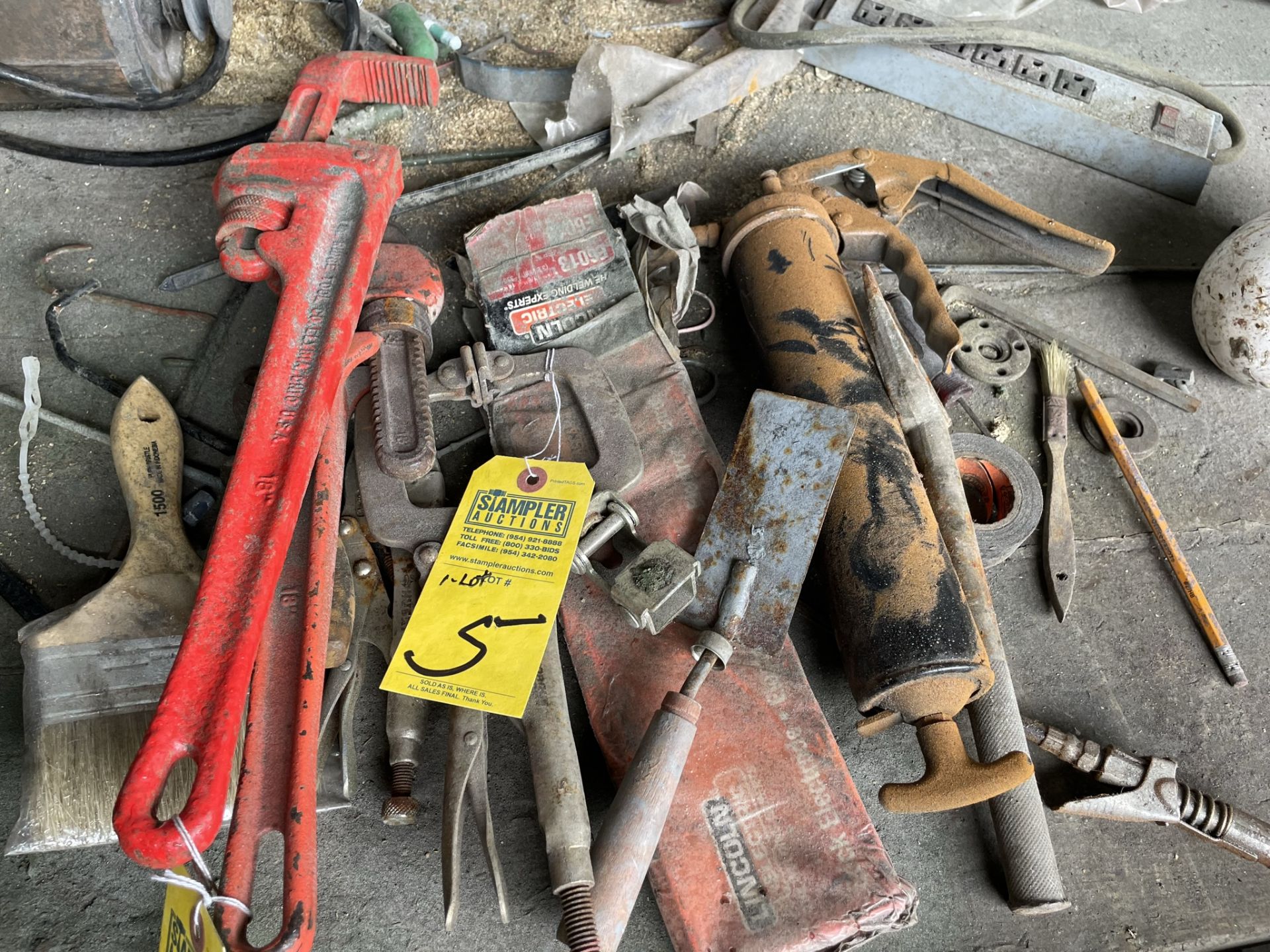 LOT ASSORTED HAND TOOLS - 2- PIPE WRENCHES / 1- WELDER'S CLAMP / 1- GREASE GUN / WELDING ROD / MORE