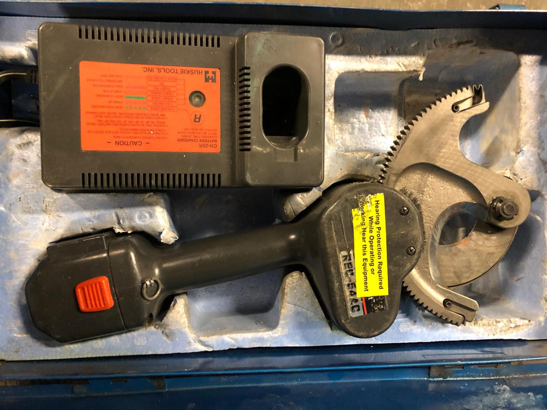 Huskie Rolo-Cut model REC-54AC Handheld Cutter Tool in case with charger
