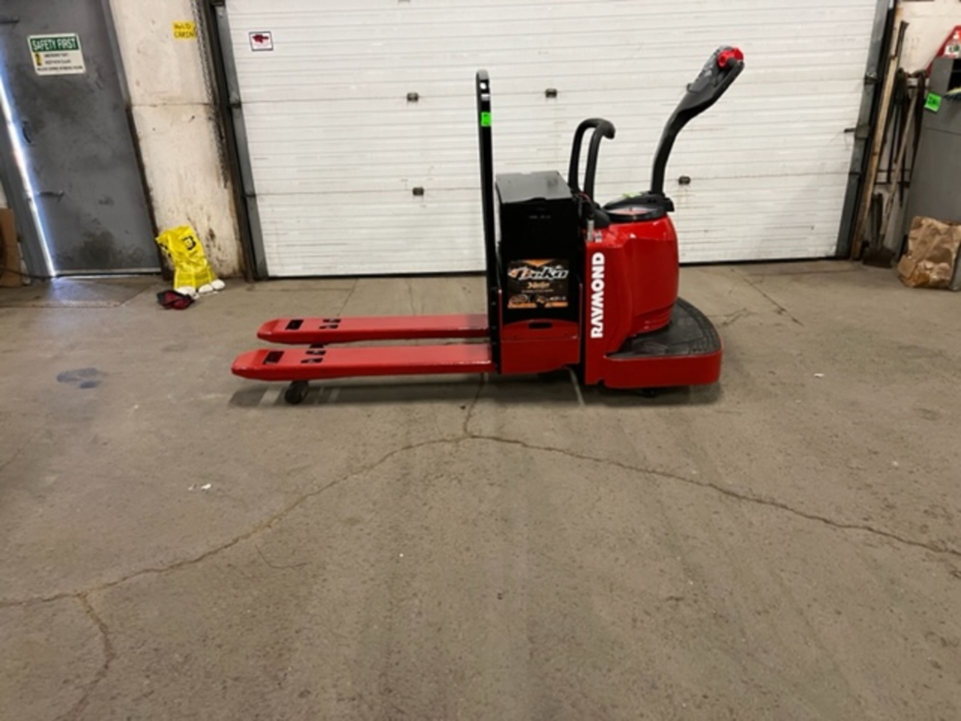 2009 Raymond Electric Ride on Powered Pallet Cart Lift 6000lbs capacity 4' Long with LOW HOURS