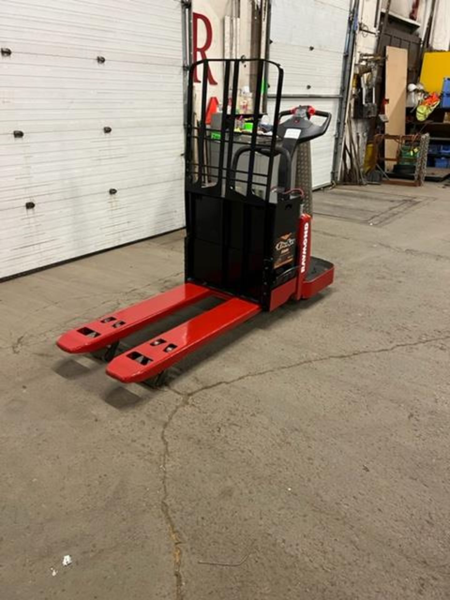 2009 Raymond Electric Ride on Powered Pallet Cart Lift 6000lbs capacity 4' Long with LOW HOURS