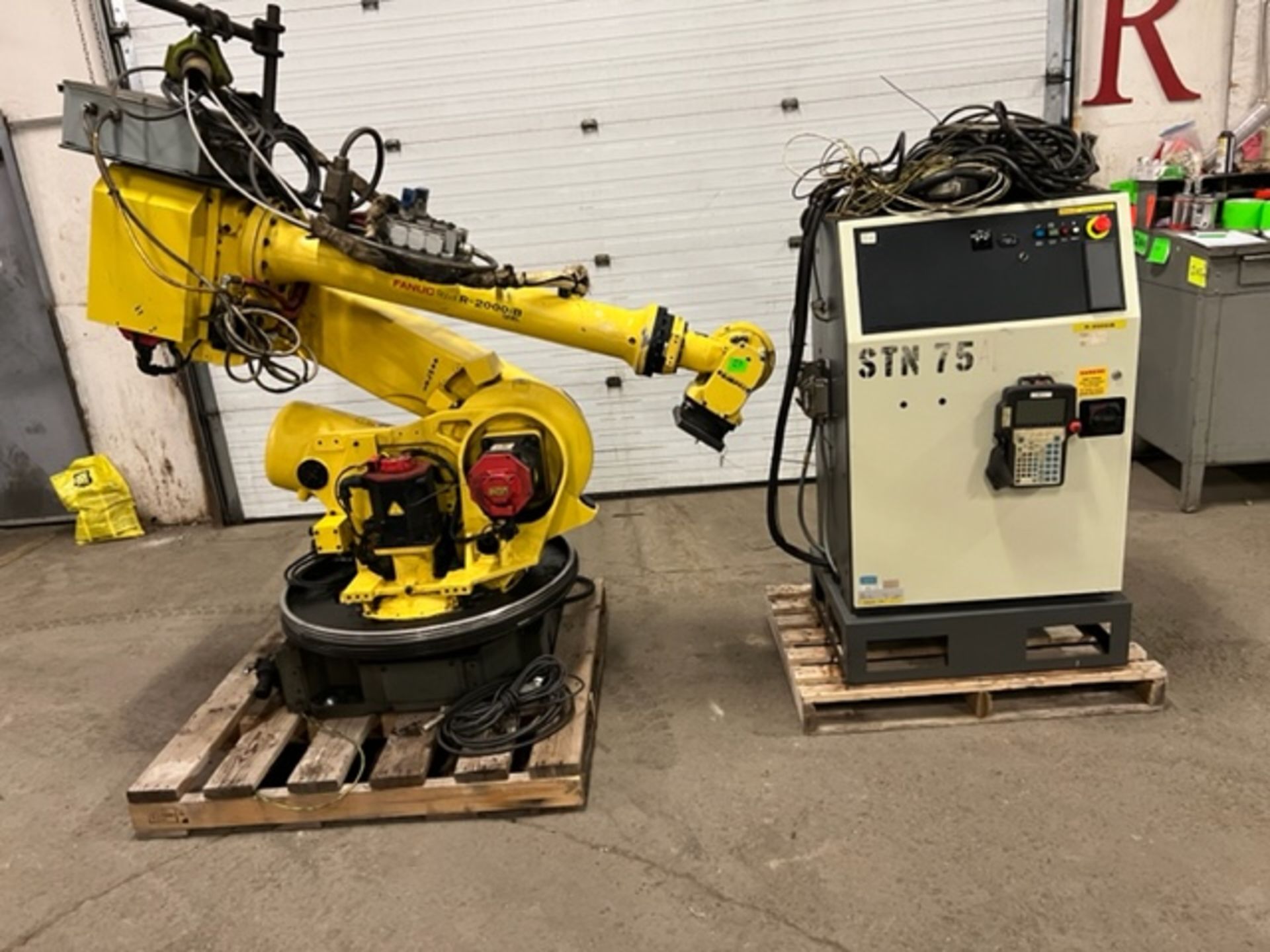 MINT 2009 Fanuc Handling Robot Model R-2000iB 125L - 125kg payload with R-30iA Controller and
