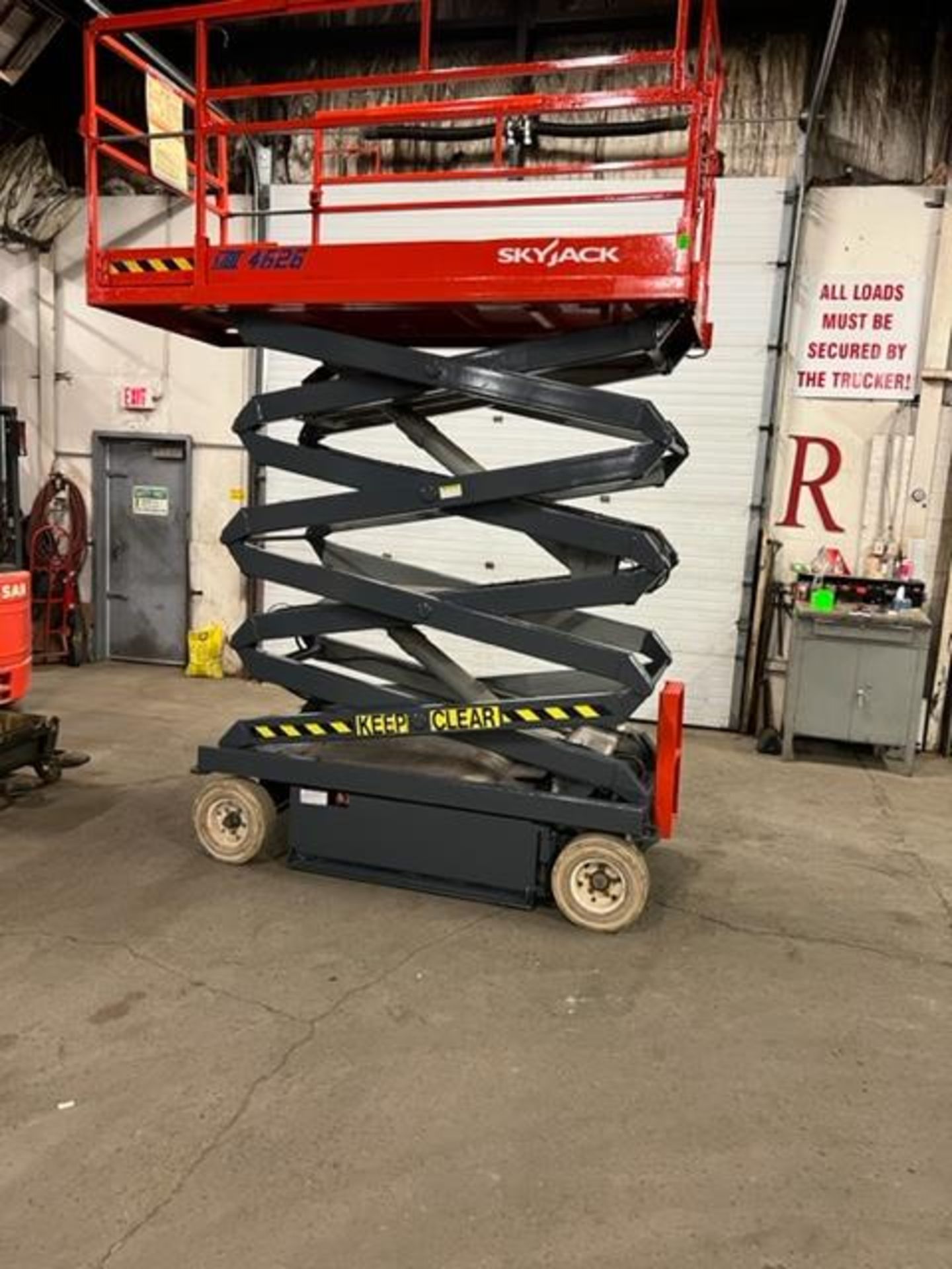 Skyjack III model 4226 Electric Motorized Scissor Lift with pendant controller & VERY LOW HOURS with