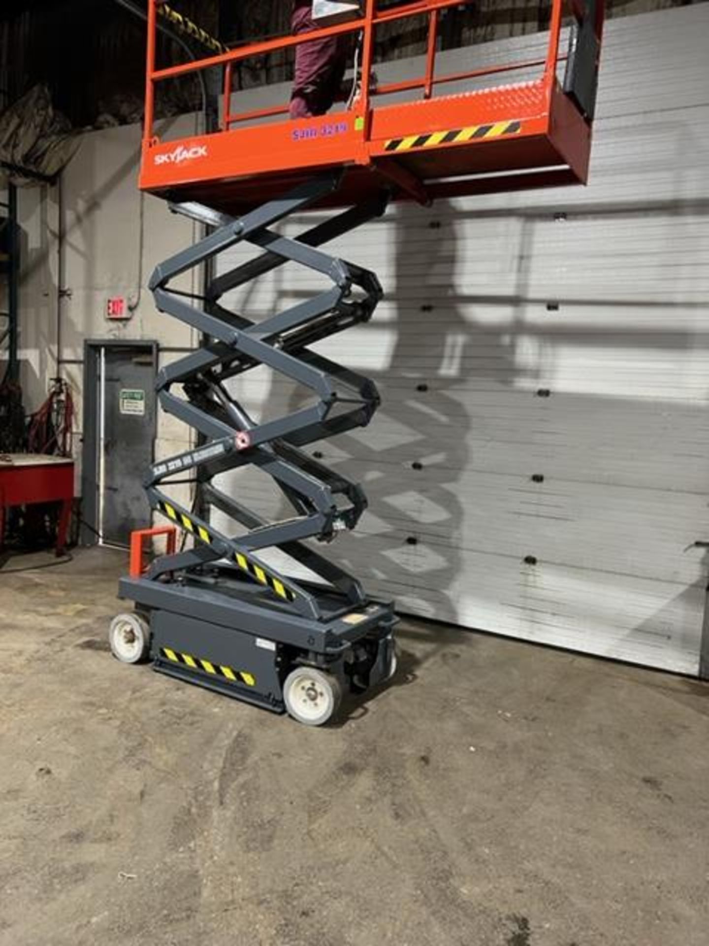 SkyJack III Electric Scissor Lift model 3219 - 19 feet lift, 32 inch width deck with pendant