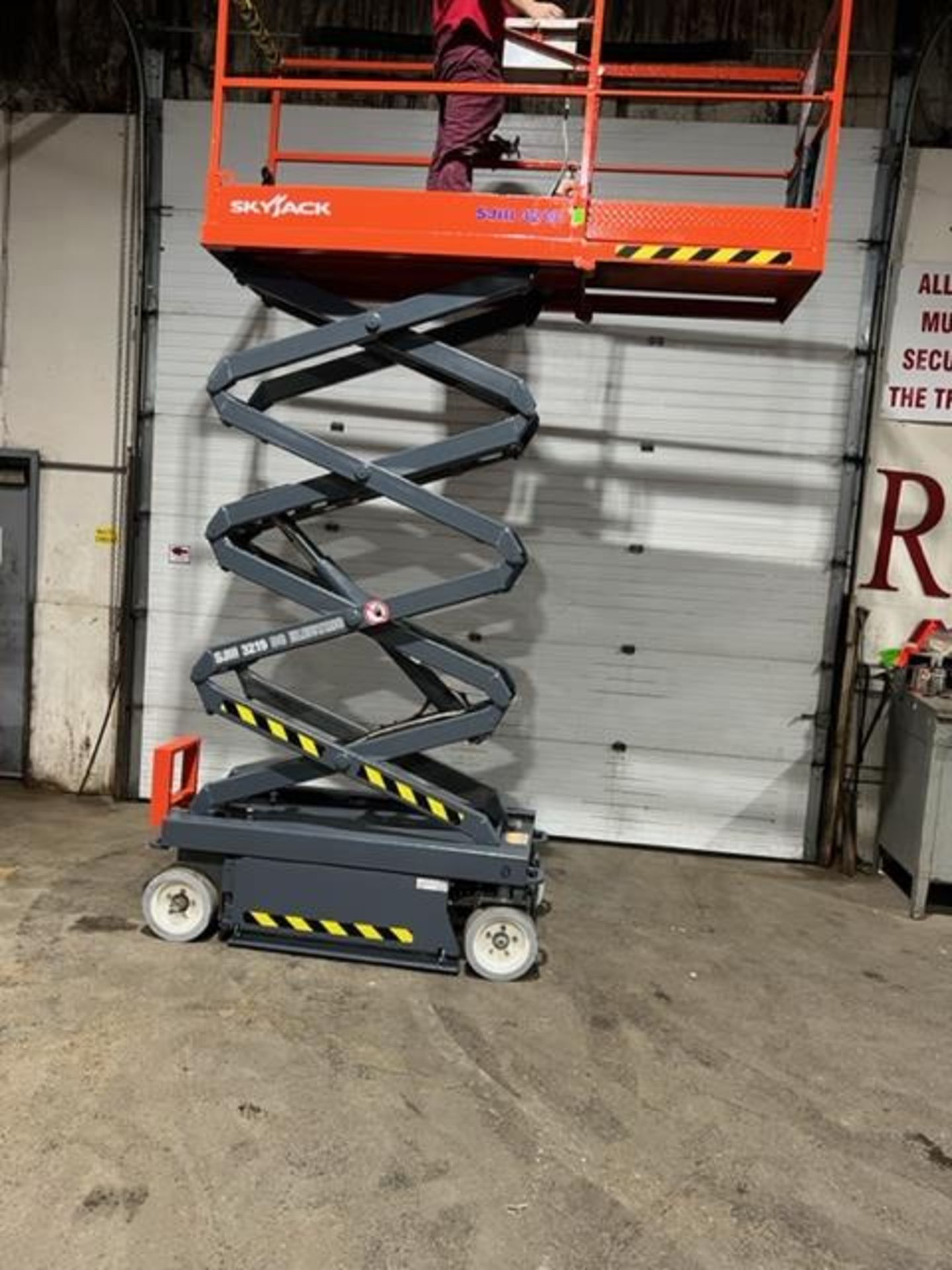 SkyJack III Electric Scissor Lift model 3219 - 19 feet lift, 32 inch width deck with pendant - Image 2 of 4