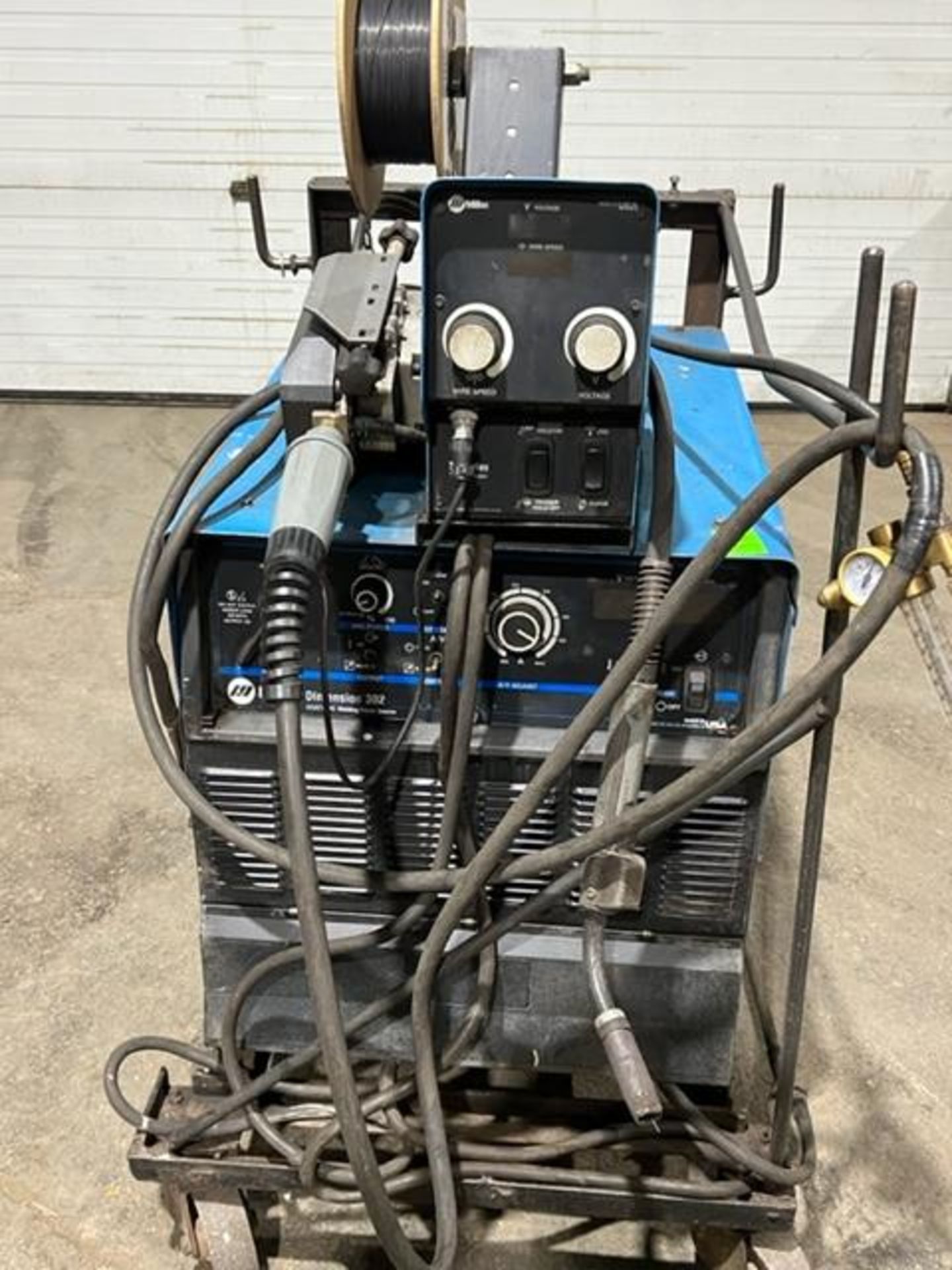 Miller Dimension 302 Mig Welder with 70S Wire Feeder 4-wheel - COMPLETE on CART with gun 300 amp