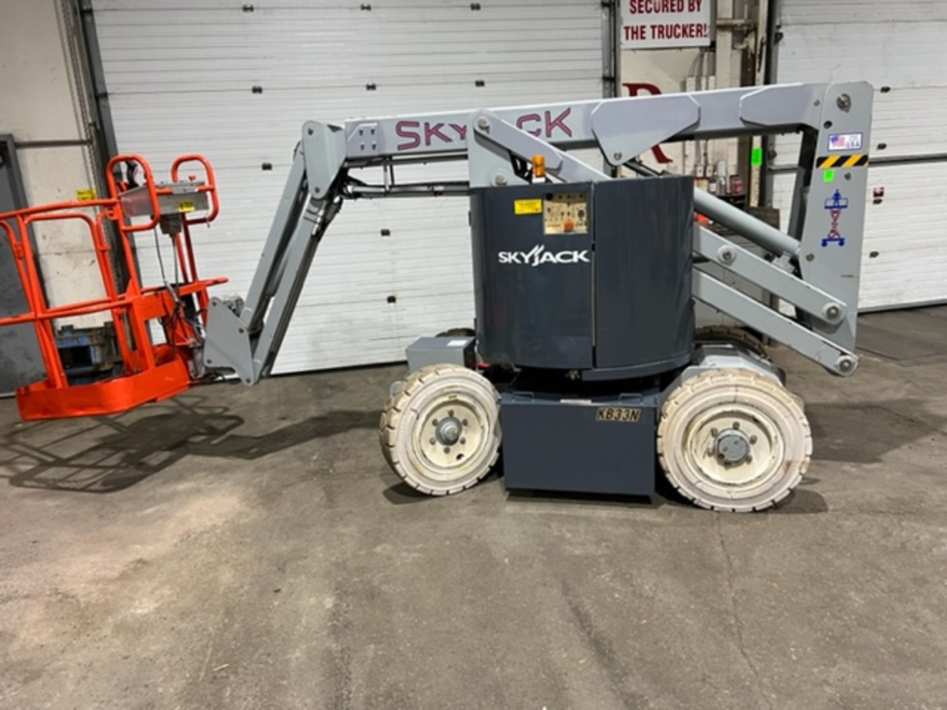 SkyJack Zoom Boom Man Lift Electric model SJKB-33N - 33 feet lift with controller - 500lbs lift - Image 2 of 4