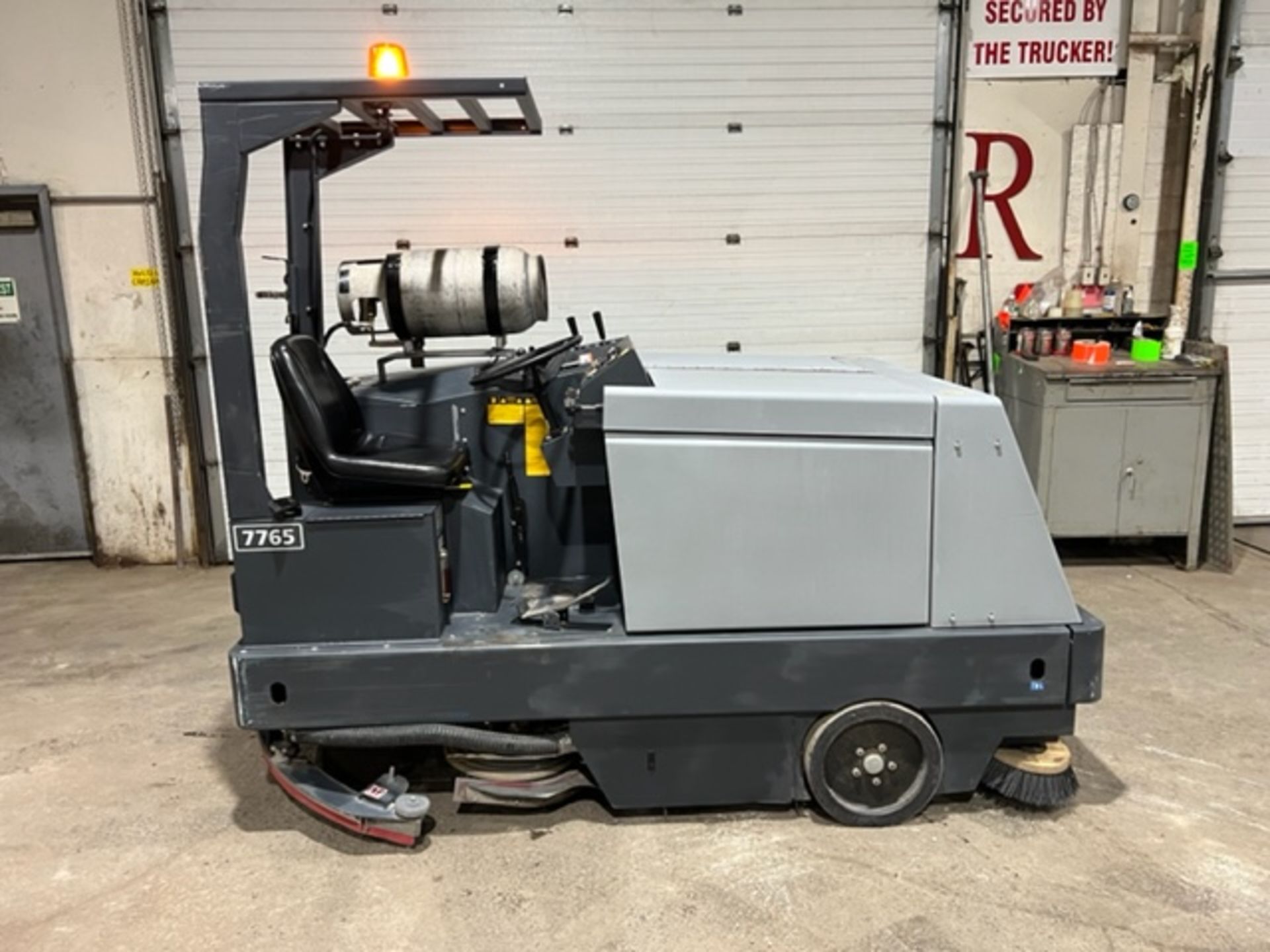 2014 Nilfisk Advance Model 7765 Floor Cleaning Machine Sweeper Scrubber Unit LPG (propane) with