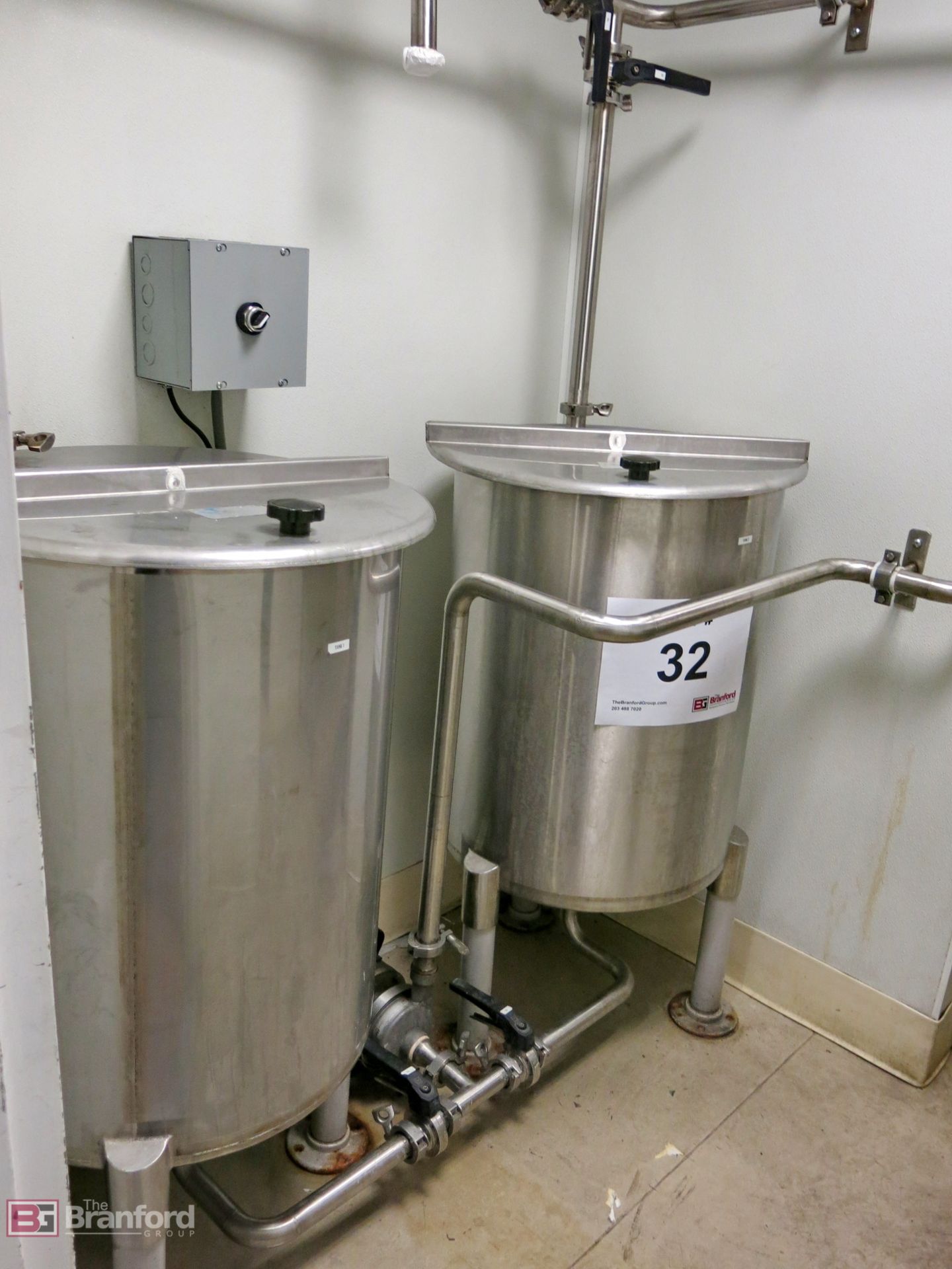 (2) Approx. 75-gallon flat bottom stainless steel liquid storage tanks