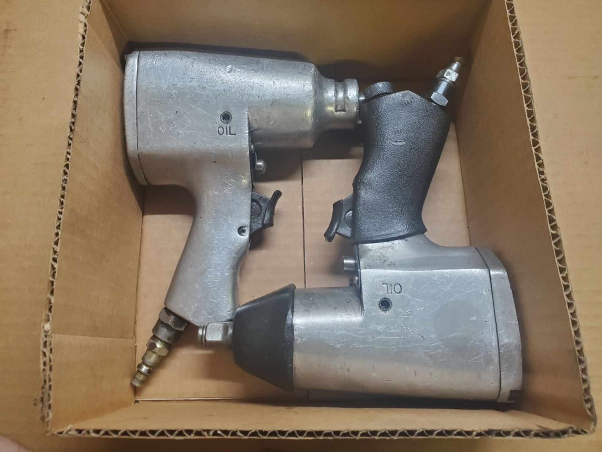 (1) DeVilbiss 1/2" Pneumatic Impact Wrench, (1) Central Pneumatic Impact Wrench