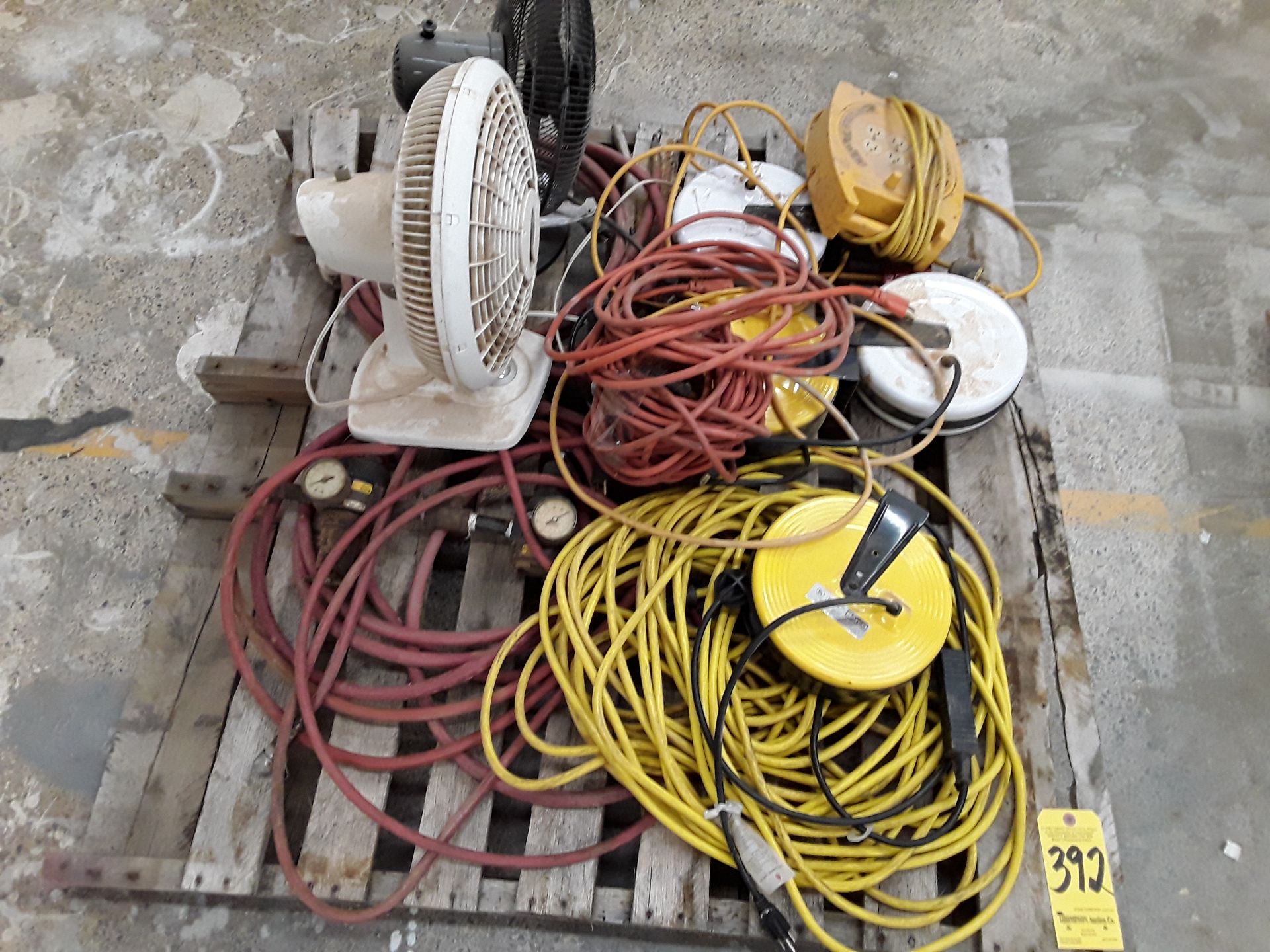 Skid Lot of Cord Reels, Extension Cords, and Fans