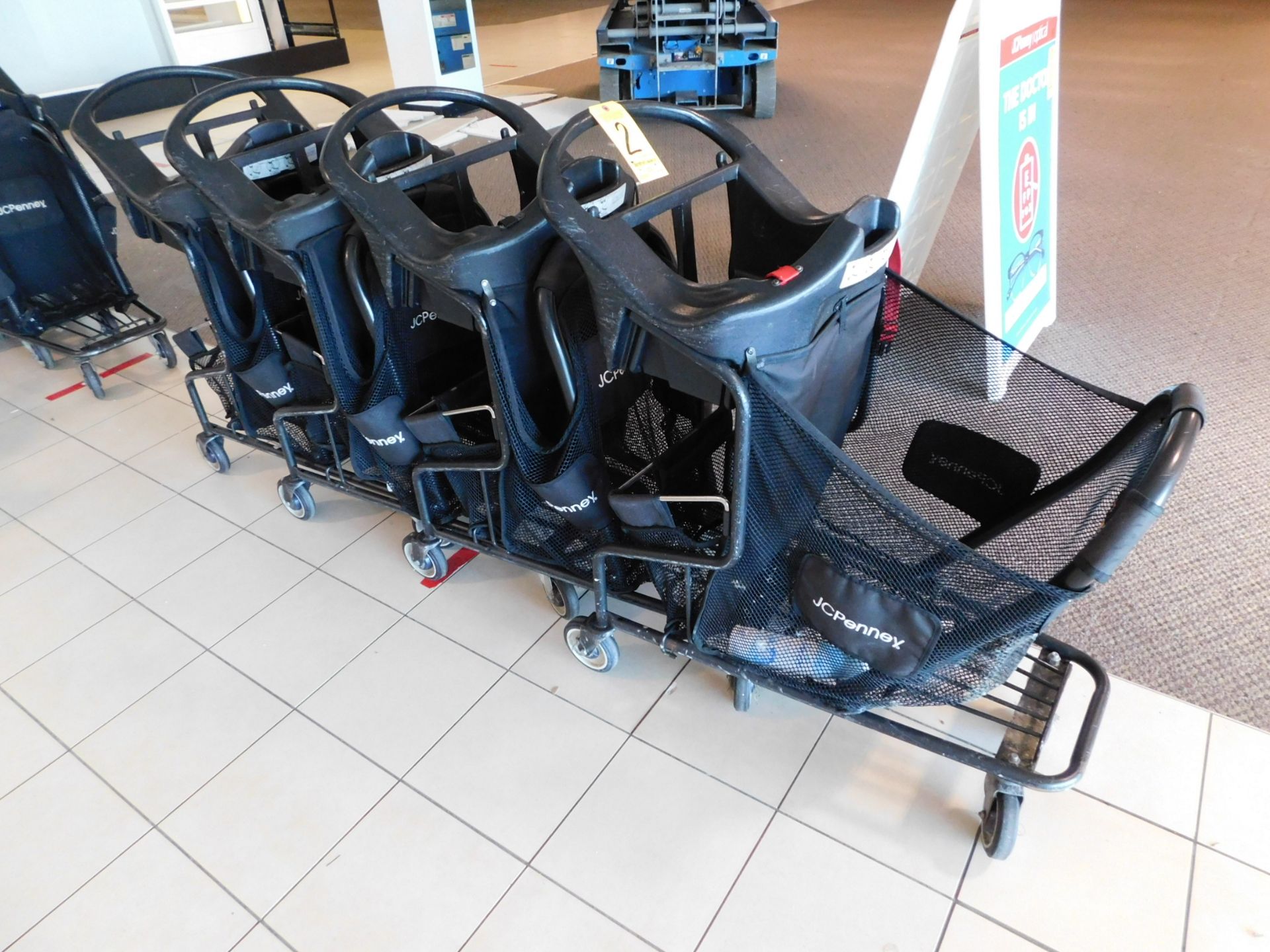 (4) Shopping Carts with Plastic Molded Infant Seat