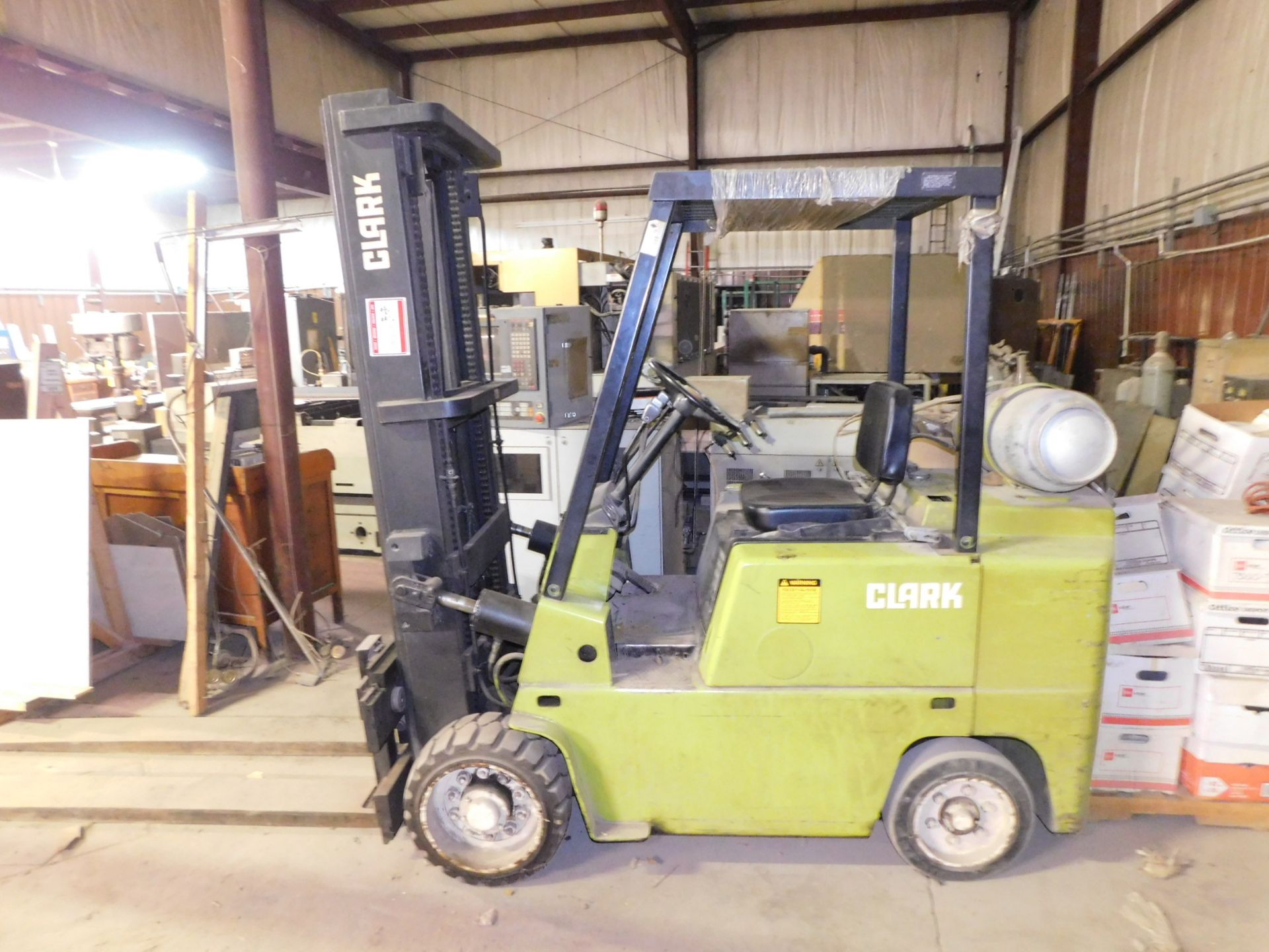 Clark Model C500-70 Fork Lift, 4,600 Lb. Capacity, LP, Side Shift, 3-Stage Mast, Hard Tire, Cage,