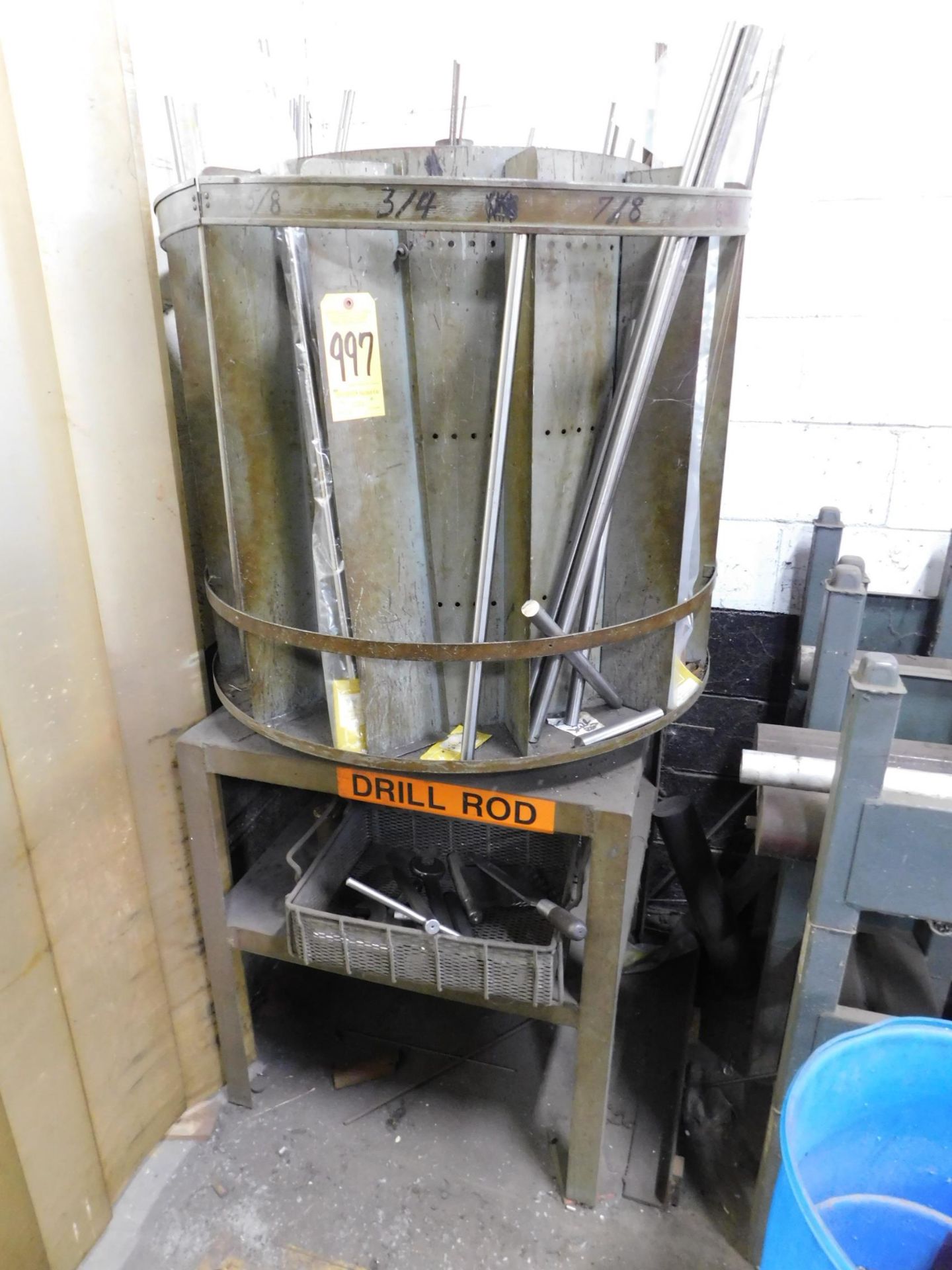 Rotating Bin with Drill Rod