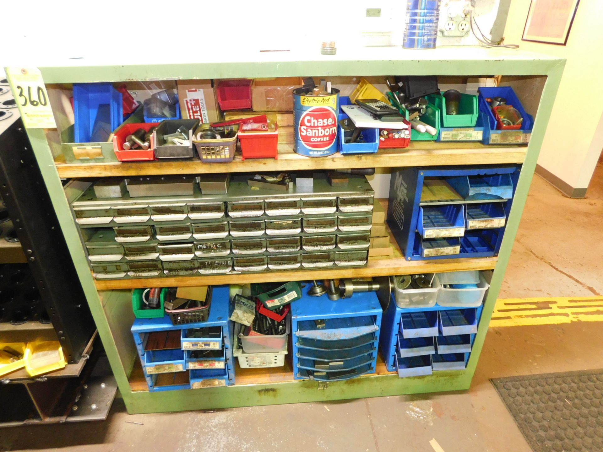 Green Shelving Unit with Contents