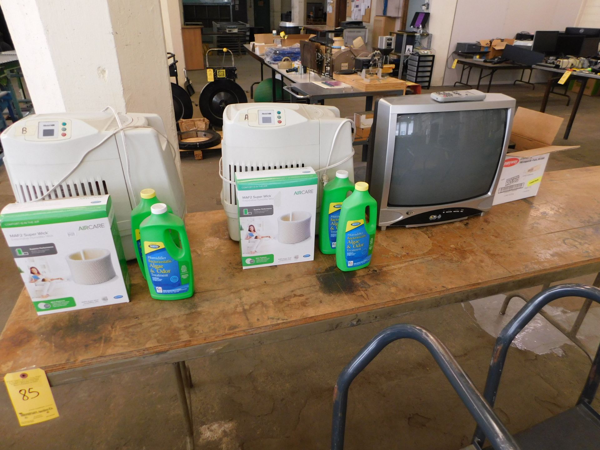 8' Table and Contents, Misc. TV and Spray Cans and (2) Moist Air Humidifiers