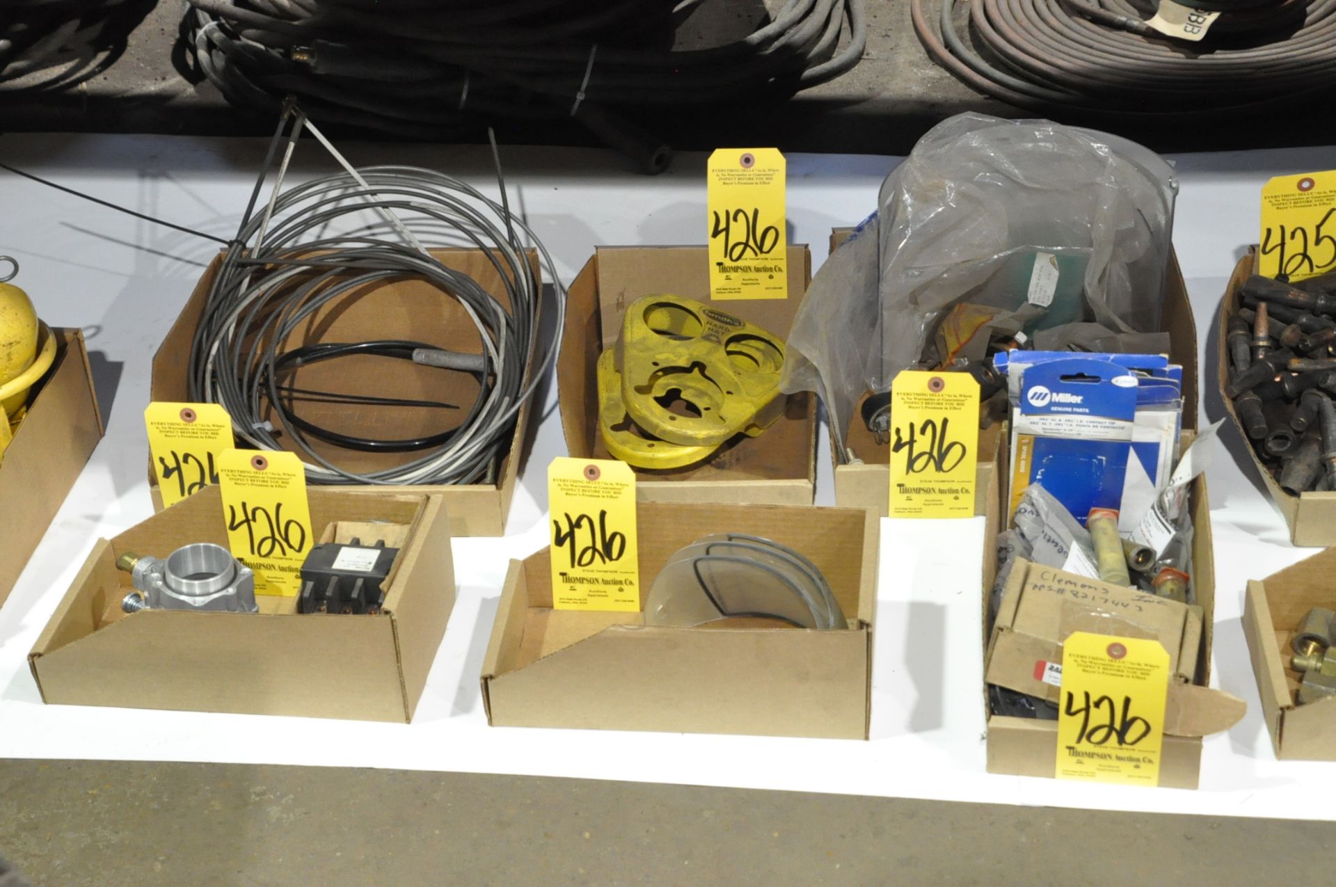 Lot-Various Torch and Welding Accessories in (6) Boxes on Floor Under (1) Table