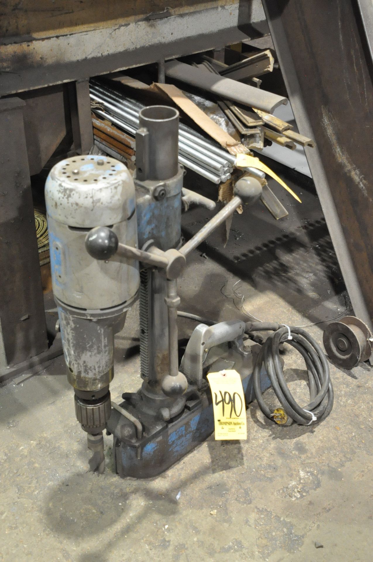 No Identifying Name Magnetic Base Drill Press on Floor Under (1) Table