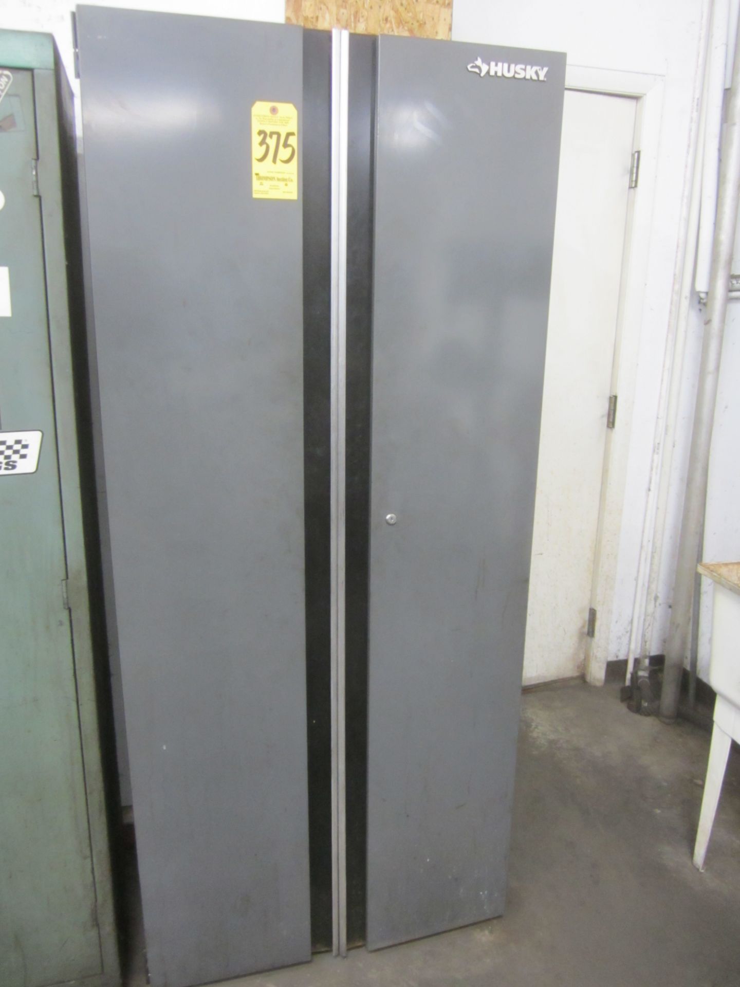 2-Door Metal Upright Storage Cabinet and Contents