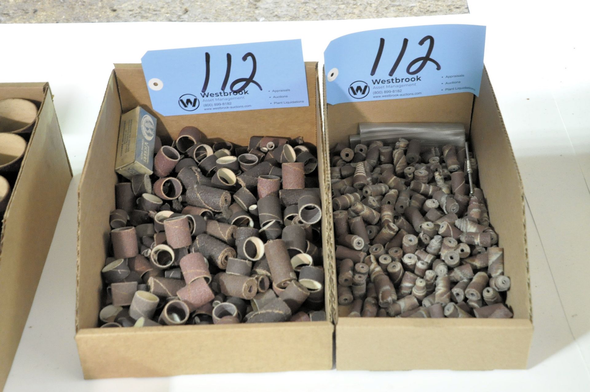 Lot-Sanding Cylinders and Tootsie Style Sanding in (2) Boxes Under (1) Table