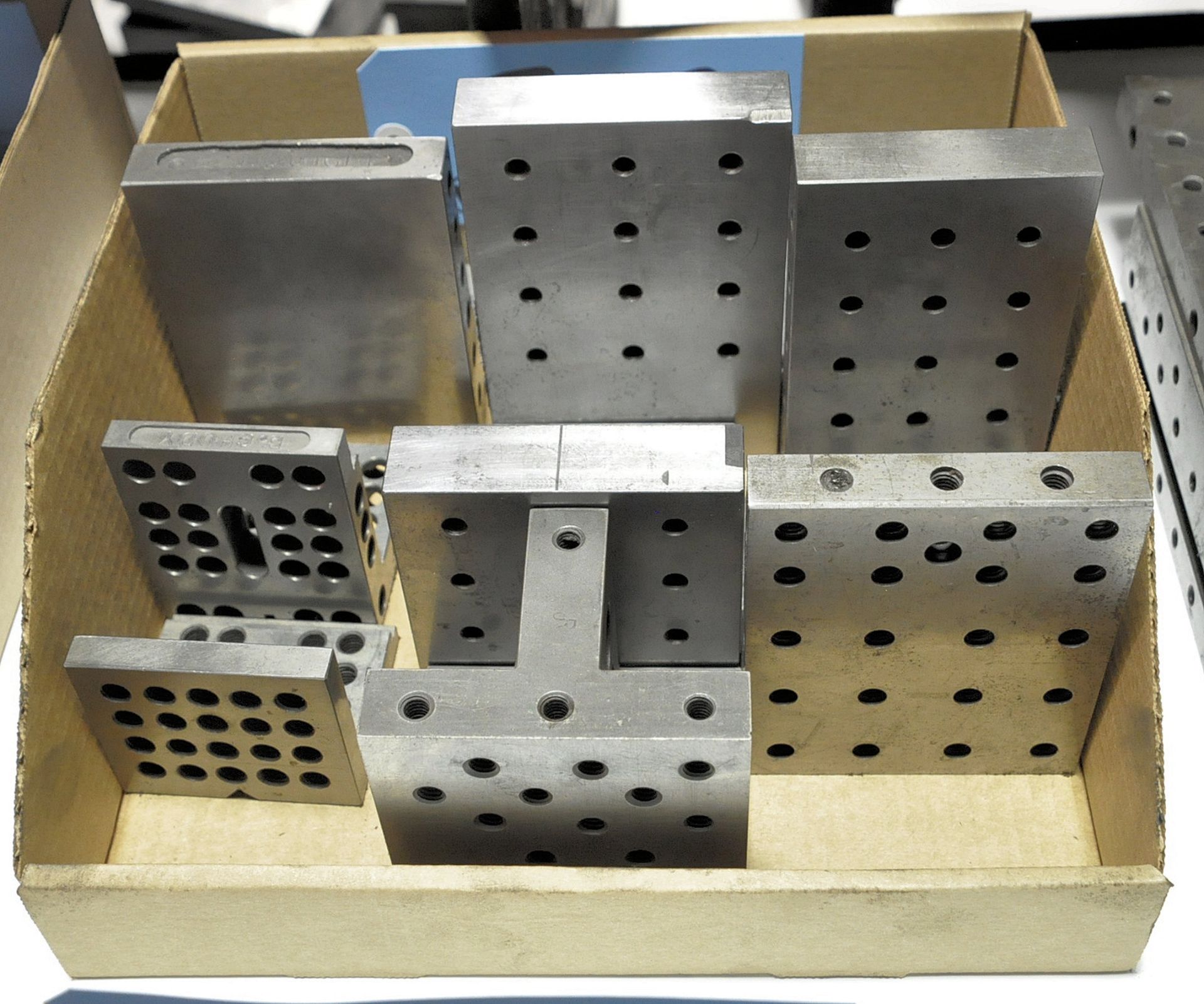 Lot-Various Angle Plates in (1) Box