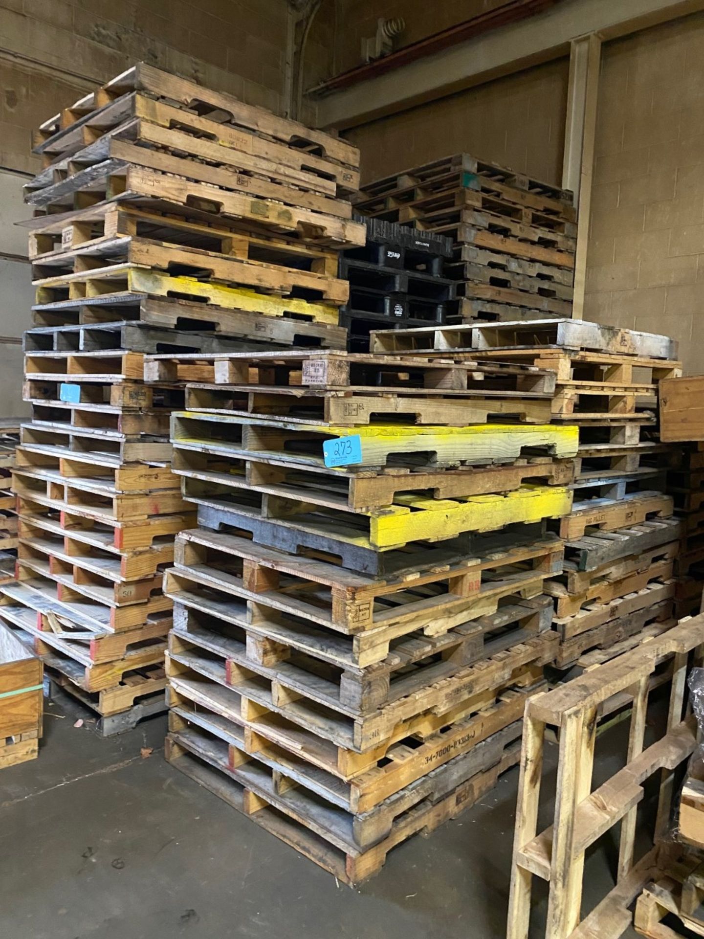 Lot-Approximately 180-200 Wood Pallets in (3) Rows, 40"-44" x 48" Approximate Dimensions