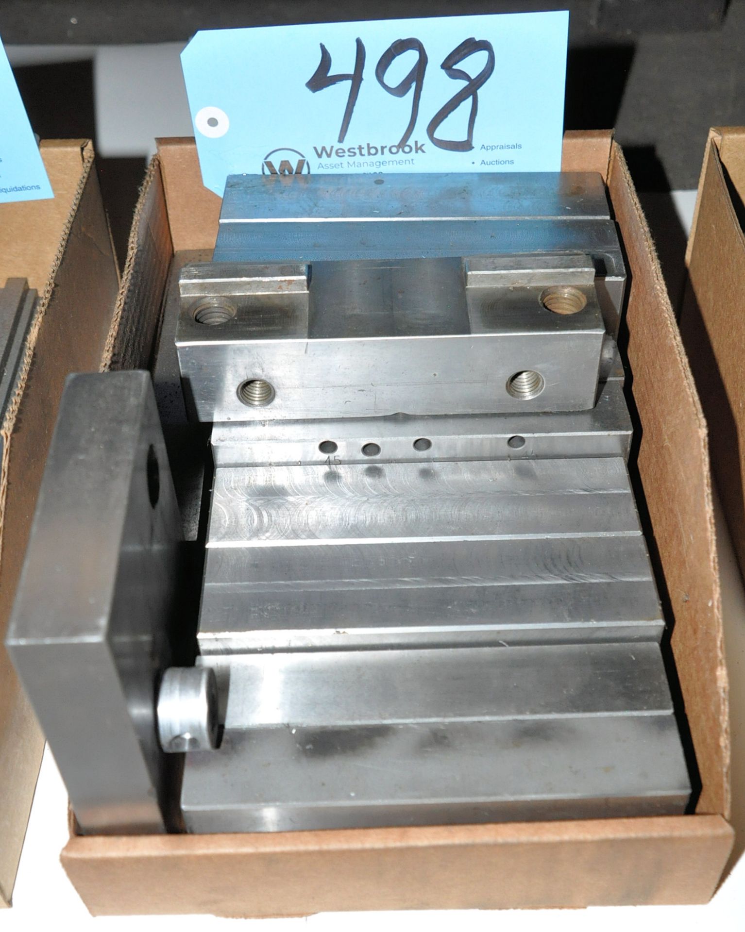 Lot-Various Machine Vise Jaws in (1) Box Under (1) Bench