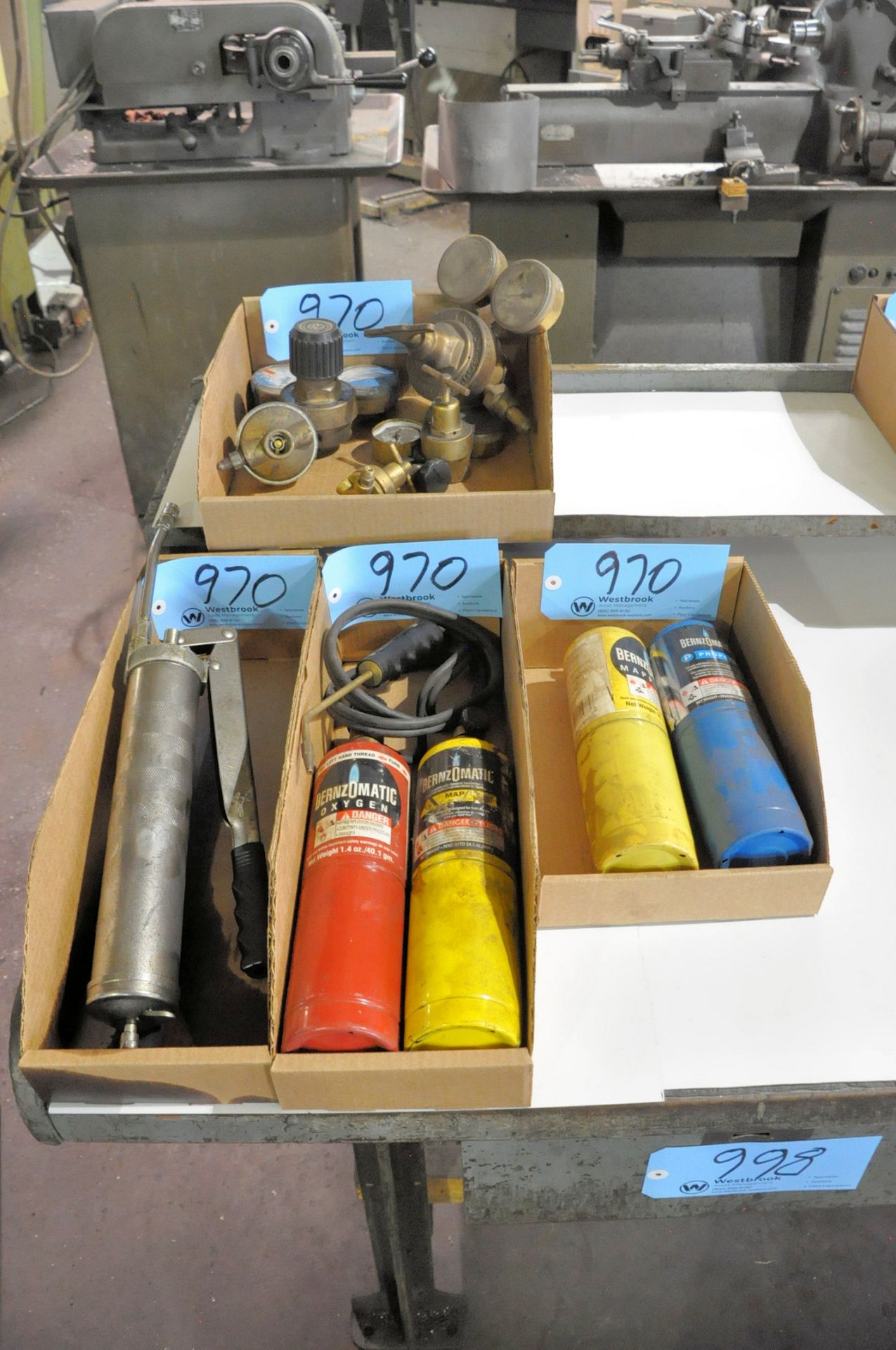 Propane Torch with Small Tanks, Grease Gun, and Regulator Gauges in (4) Boxes