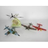 Dinky Toys - A fleet of four unboxed later issue Dinky Toys diecast model aircraft.