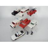 Dinky Toys - An unboxed squad of late issue Dinky Toys emergency vehicles.