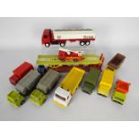 Dinky Toys - A fleet of 11 unboxed later issue Dinky Toys diecast commercial vehicles.