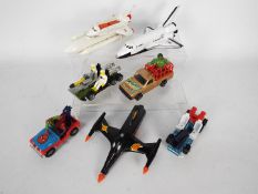 Dinky Toys, Corgi Toys, Ertl - An unboxed collection of space and TV related diecast model vehicles.