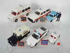 Dinky Toys - An unboxed squad of late issue Dinky Toys emergency vehicles.