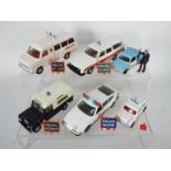 Dinky Toys - An unboxed squad of late issue Dinky Toys emergency vehicles.