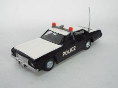 Dinky Toys - An unusual and unlisted version of Dinky Toys #244 Plymouth Fury Police Car.