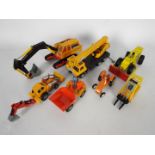 Dinky Toys - An unboxed group of seven construction related diecast model vehicles from Dinky Toys.