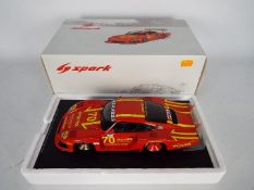 Spark - A highly detailed 1:18 scale DRM Porsche 935/78 in Momo Penthouse livery as driven by