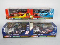 Scalextric - Four boxed Scalextric Nascar models.