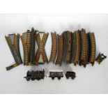 Bing - A box of loose Miniature 1920s 00 gauge Table Railway items.