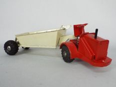 Marx Lumar - A vintage pressed steel bottom shute dumper truck.