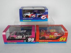 Scalextric - Three boxed Scalextric Nascar 'Ford Taurus' Special Edition models.