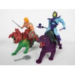 Mattel - An unboxed vintage Masters of the Universe He-Man with Battle Cat together with an unboxed