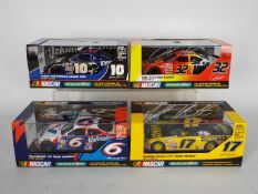 Scalextric - Four boxed Scalextric Nascar models.