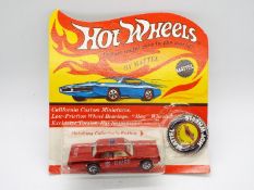 Hot Wheels - Redline - An unopened original carded Fire Chief Cruiser Plymouth Fury in Red.