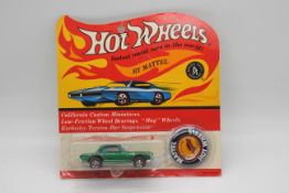 Hot Wheels - Redline - An original unopened carded 1969 issue Mercedes-Benz 280SL in green.