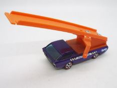 Hot Wheels - Redline - Sky Show - A restored original Deora in Purple with Sky Show livery.