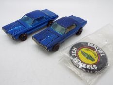 Hot Wheels - Redline - 2 x Custom Ford Cougar models and a Collectors Button.